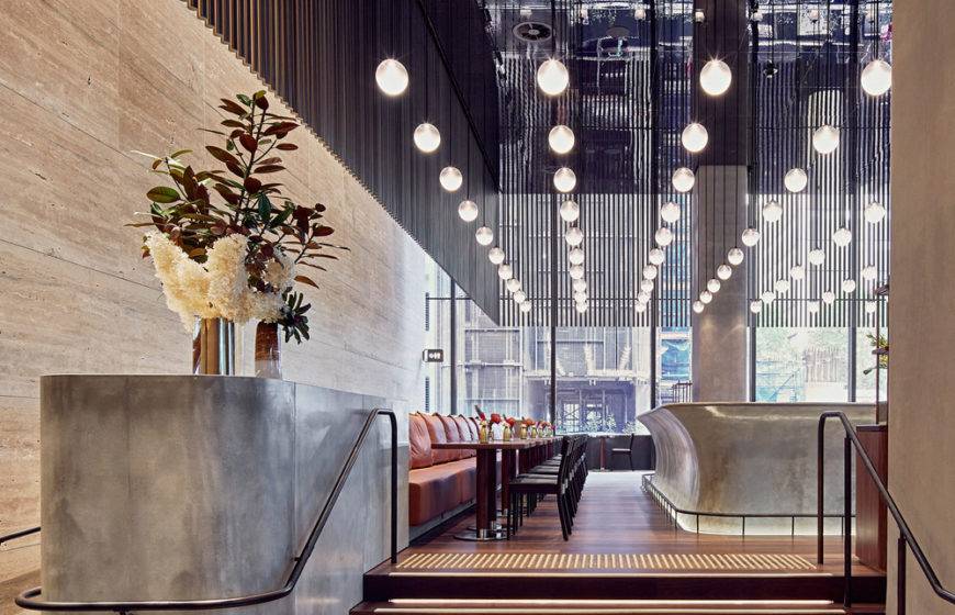 ADesignStudio used 90 hand-blown frosted glass spheres to create a striking installation for BarLume Restaurant in Sydney